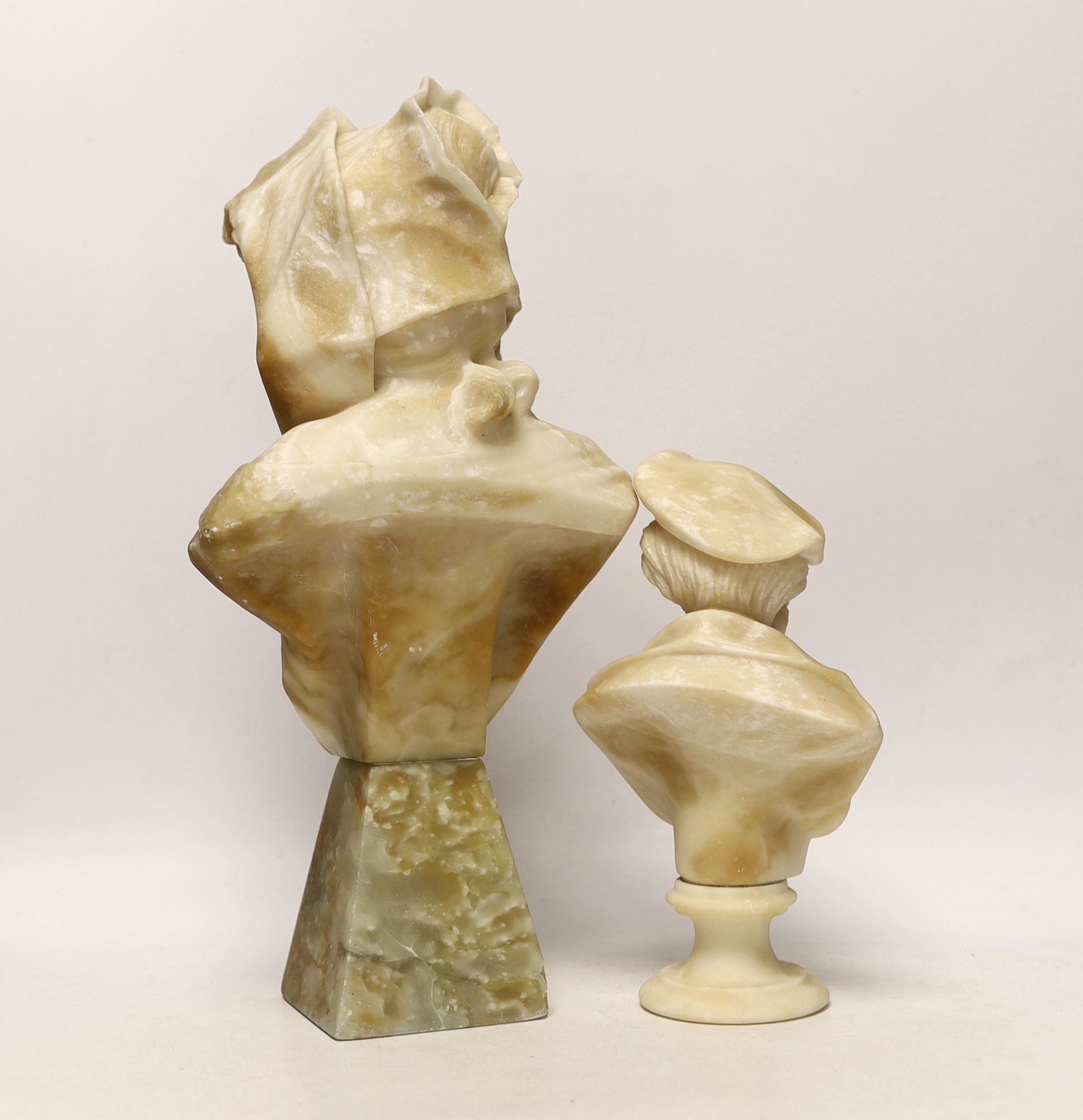 An early 20th century Italian alabaster female portrait bust, 34cm high, and a smaller bust of Richard Wagner